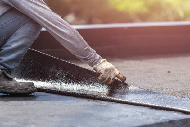 Professional Waterproofing technician working in Forest Hill, MD